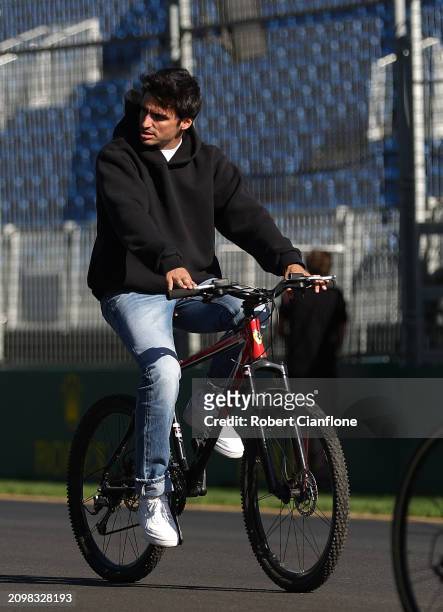 Carlos Sainz of Spain and Scuderia Ferrari rides the circuit during previews ahead of the F1 Grand Prix of Australia at Albert Park Circuit on March...