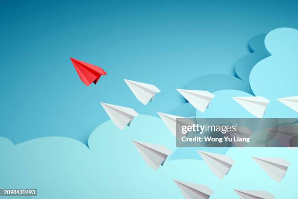red paper plane leadership concept - paper plane shadow stock pictures, royalty-free photos & images