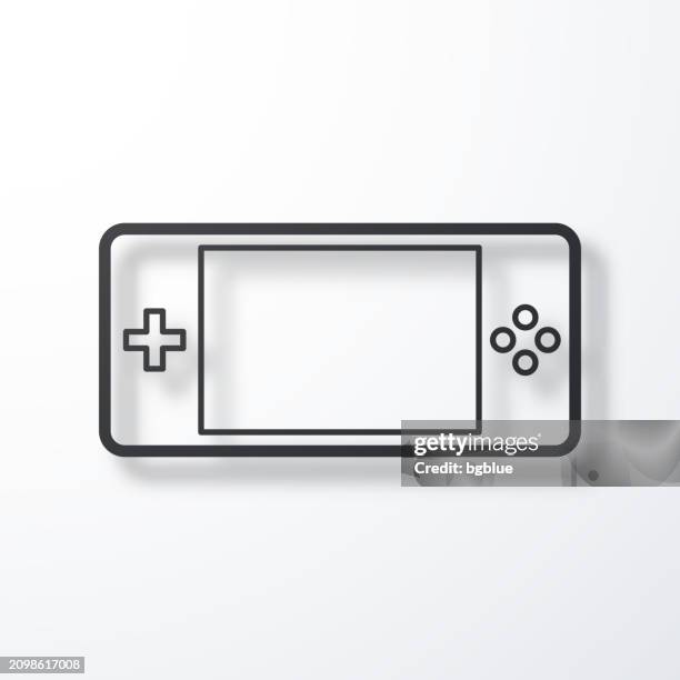 handheld game console. line icon with shadow on white background - pocket electronic game stock illustrations