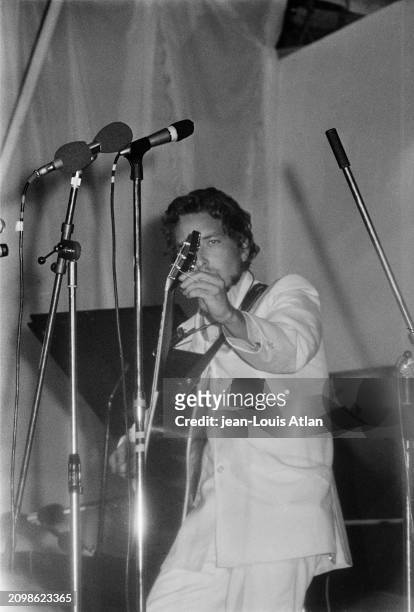 American singer Bob Dylan performs at the International Pop and Rock Festival of the Isle of Wight, 31st August 1969.