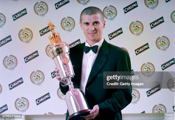 Manchester United player Roy Keane with his PFA Player of the year trophy at the Grosvenor House Hotel in London, 30th April 2000.