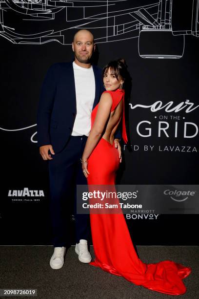 Tom Bellchambers and Olympia Bellchambers attend Glamour On The Grid at Albert Park Grand Prix Circuit on March 20, 2024 in Melbourne, Australia.