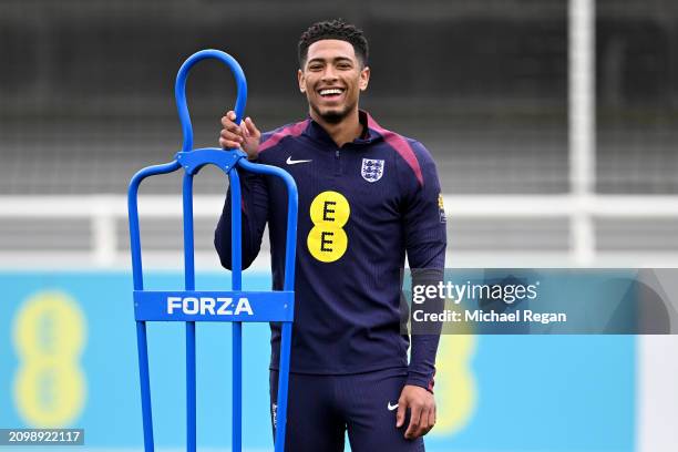 Jude Bellingham of England reacts during a training session at St Georges Park on March 20, 2024 in Burton-upon-Trent, England.