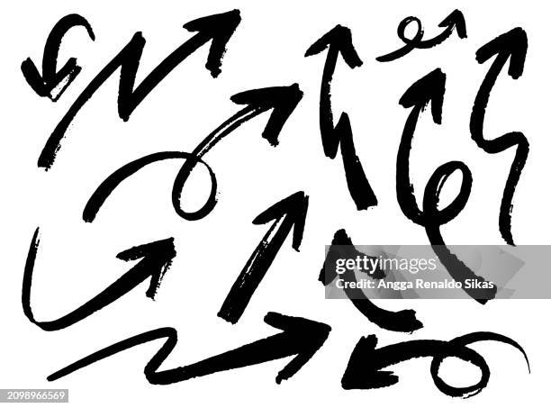 black and white ink brush arrows - arrow sketch stock illustrations