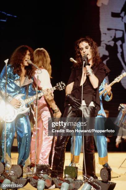 American singer Alice Cooper performs with the rock band Alice Cooper in front of a studio audience on the set of a pop music television show in...