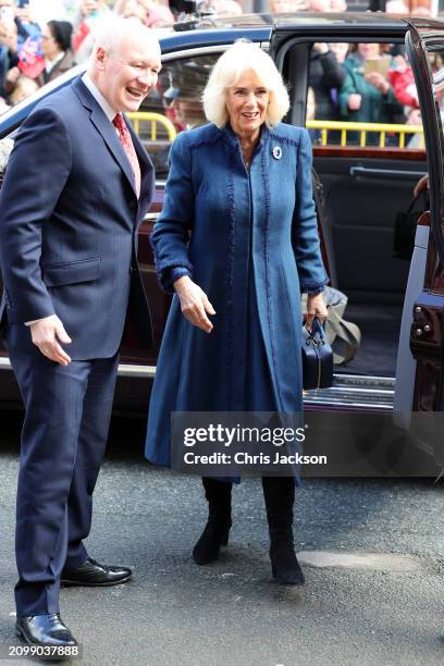 Lieutenant Governor Sir John Lorimer greets Queen Camilla on her arrival to Douglas Borough Council on March 20, 2024 in Douglas, Isle of Man. The...