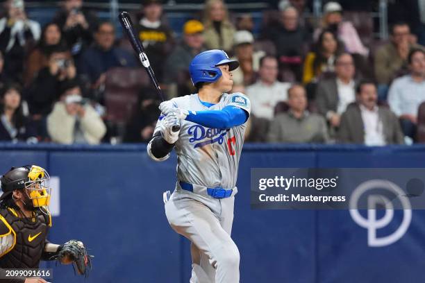 Shohei Ohtani of the Los Angeles Dodgers hits a RBI single in the 8th inning during the 2024 Seoul Series game between Los Angeles Dodgers and San...