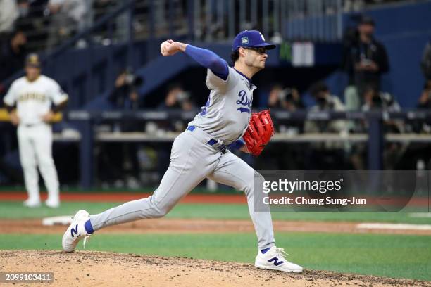 Joe Kelly of the Los Angeles Dodgers throws in the 8th inning during the 2024 Seoul Series game between Los Angeles Dodgers and San Diego Padres at...