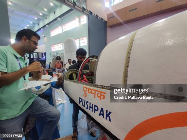 Aerospace engineers put the final touches to a rocket before undertaking the third flight test of its very own version of a `Space Shuttle in a...
