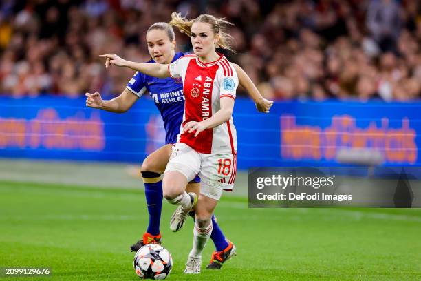 Guro Reiten of Chelsea FC and Milicia Keijzer of AFC Ajax battle for the ball during the UEFA Women's Champions League 2023/24 Quarter Final Leg One...