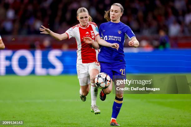 Milicia Keijzer of AFC Ajax and Niamh Charles of Chelsea FC battle for the ball during the UEFA Women's Champions League 2023/24 Quarter Final Leg...