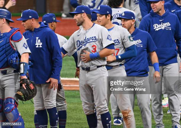 Shohei Ohtani of Los Angeles Dodgers celebrates with teammates after winning the 2024 Seoul Series game between Los Angeles Dodgers and San Diego...