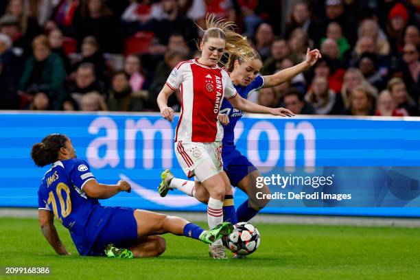 Milicia Keijzer of AFC Ajax, Lauren James of Chelsea FC battle for possession during the UEFA Women's Champions League 2023/24 Quarter Final Leg One...