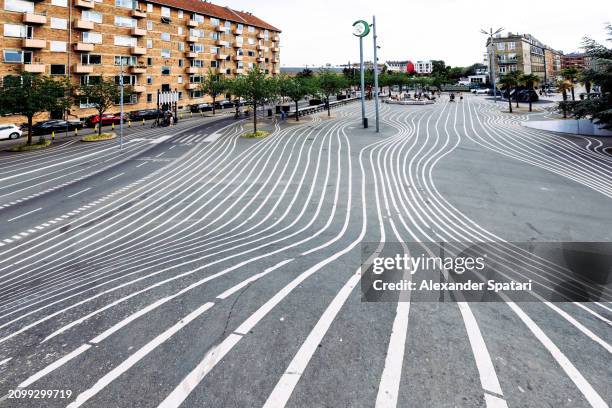 superkilen urban public park in copenhagen, denmark - bicycle lane stock pictures, royalty-free photos & images
