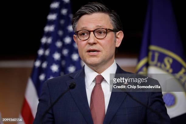 Speaker of the House Mike Johnson speaks during a news conference following a closed-door caucus meeting at the U.S. Capitol Visitors Center on March...