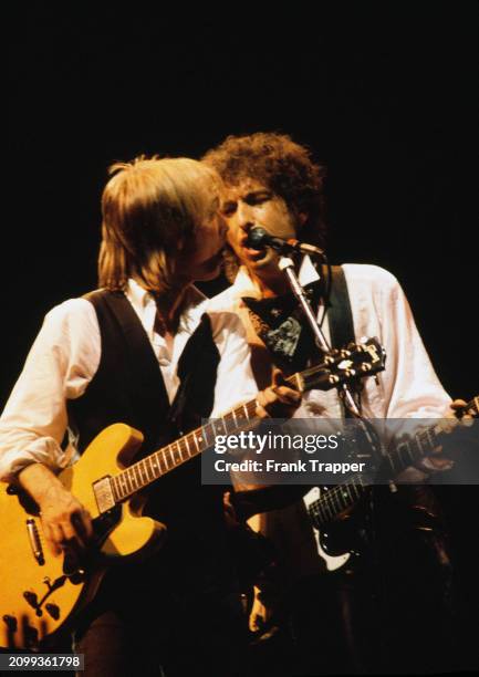 Bob Dylan and Tom Petty performing in concert at the San Diego Sports Arena, 9th June 1986.