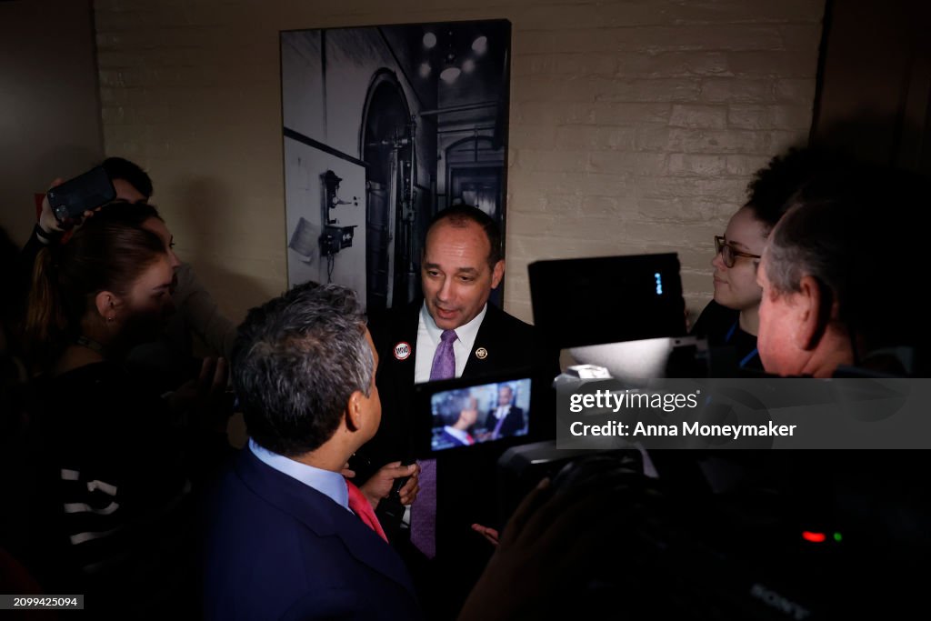 Rep. Bob Good is followed by reporters as he departs from the House ...