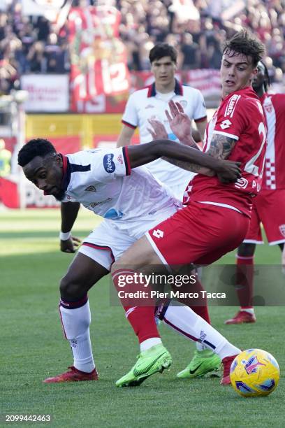 Antonie Makoumbou of Cagliari Calcio competes for the ball with Daniel Maldini of AC Monza during the Serie A TIM match between AC Monza and Cagliari...