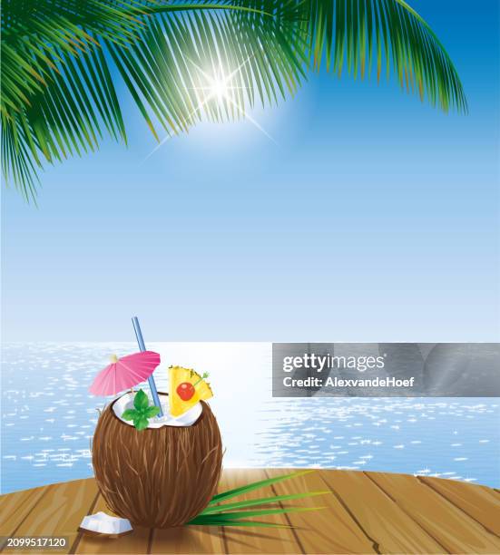 pina colada auf einem tisch mit tropischem meer und palmenblatt - coconut milk stock-grafiken, -clipart, -cartoons und -symbole