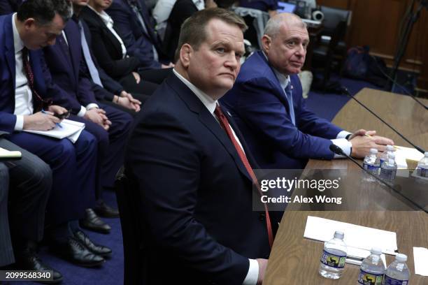 Tony Bobulinski , former business partner of Hunter Biden, and Lev Parnas , former associate of Rudy Giuliani, are sworn in during a hearing before...