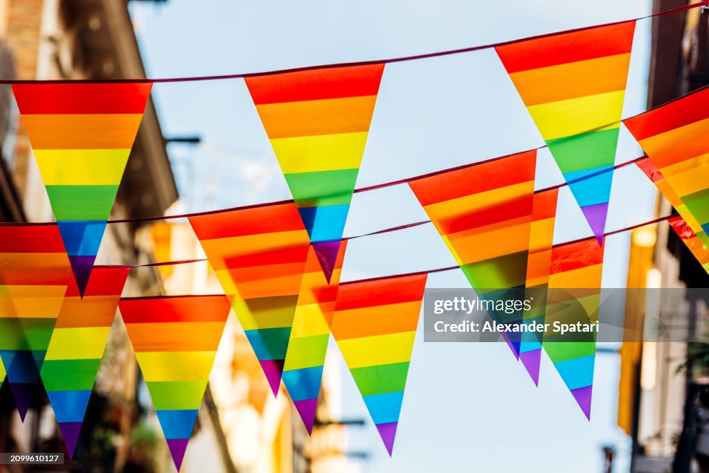 Rainbow coloured flags decoration on the street for LGBTQI+ Pride month