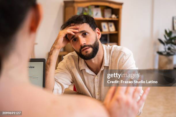 mid adult businessman during consultation with psychologist in office - being fired stock pictures, royalty-free photos & images