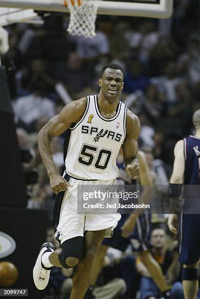 David Robinson of the San Antonio Spurs runs upcourt in Game six of the 2003 NBA Finals against the New Jersey Nets on June 15, 2003 at the SBC...