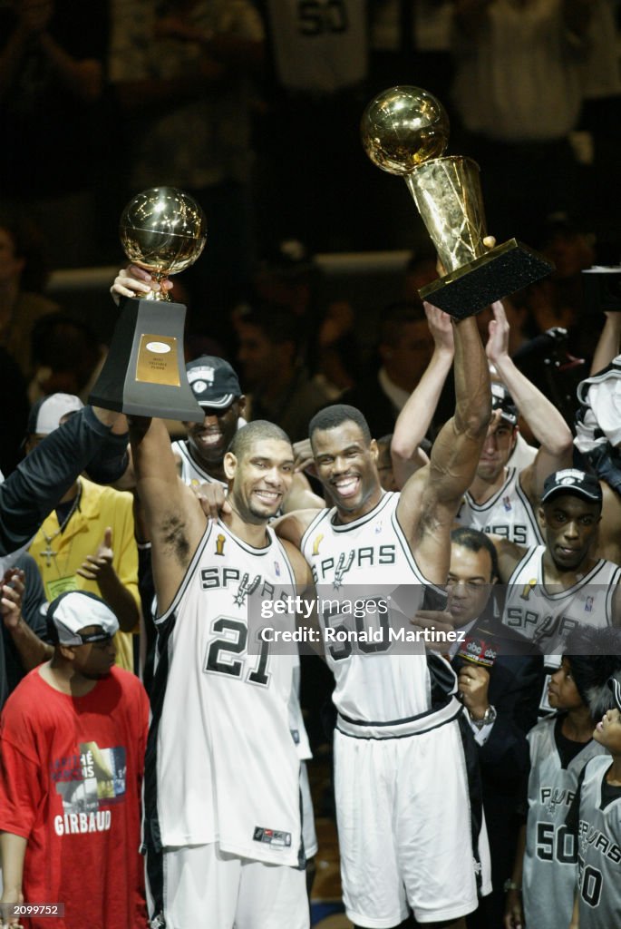 Duncan and Robinson show trophies