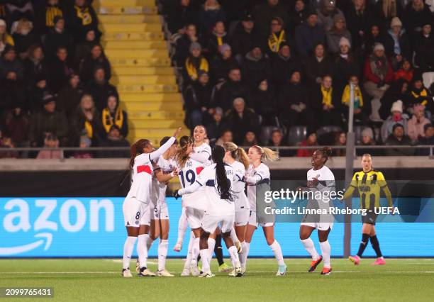 Eva Julianna Gaetino of Paris Saint-Germain celebrates scoring her team's first goal with team mates during the UEFA Women's Champions League 2023/24...