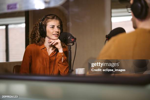 colleagues recording podcast together - locutor-de-rádio imagens e fotografias de stock