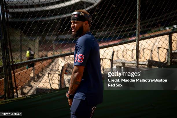 Luis Guerrero of the Boston Red Sox stretches in the bullpen before a 2024 Dominican Republic Series game against the Tampa Bay Rays as part of the...