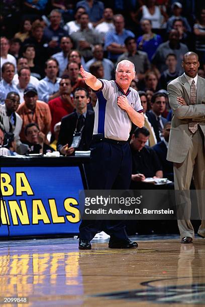 Referee Joe Crawford calls a charge during Game one of the 2003 NBA Finals between the New Jersey Nets and the San Antonio Spurs at the SBC Center on...
