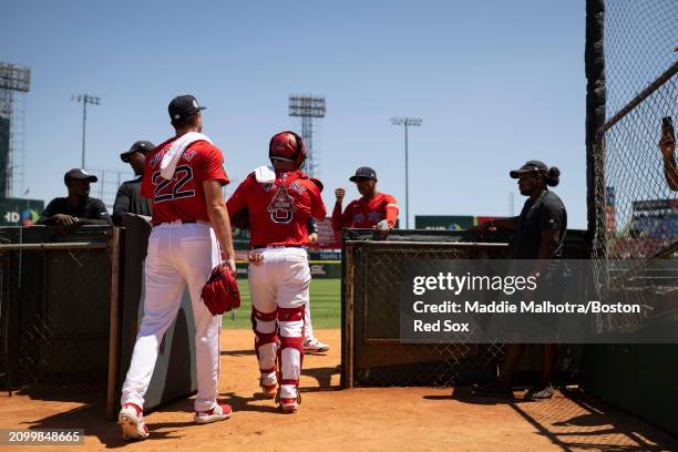 Garrett Whitlock of the Boston Red Sox and Reese McGuire of the Boston Red Sox walk out of the bullpen before a 2024 Dominican Republic Series game...