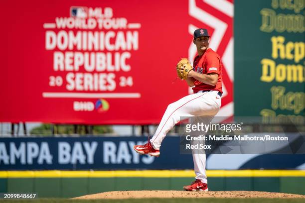 Justin Hagenman of the Boston Red Sox pitches during the 2024 Dominican Republic Series game against the Tampa Bay Rays as part of the MLB World Tour...