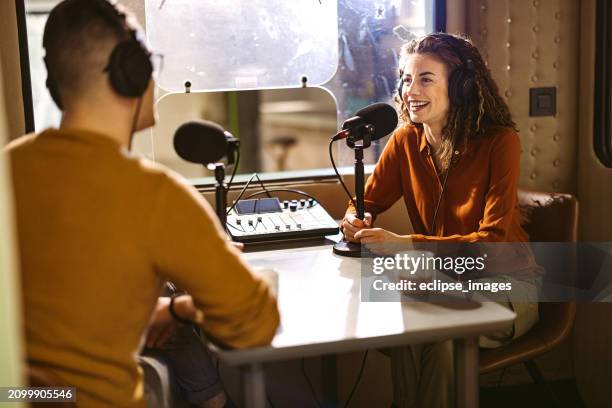colleagues recording podcast together - locutor-de-rádio imagens e fotografias de stock