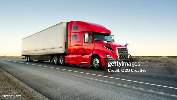long haul semi truck on a western usa interstate highway - heavy goods vehicle stock pictures, royalty-free photos & images