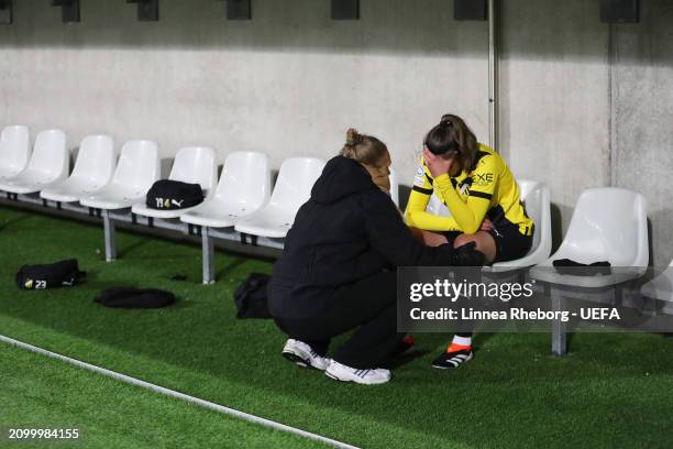 Anna Csiki of BK Hacken is consoled as she reacts to defeat after the UEFA Women's Champions League 2023/24 Quarter Final Leg One match between BK...