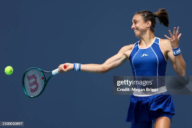 Petra Martic of Croatia returns a shot to Claire Liu of the United States during her women's singles match during the Miami Open at Hard Rock Stadium...