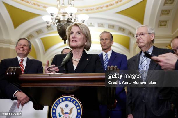 Sen. Shelley Moore Capito speaks during a news conference following a Senate Republican policy luncheon alongside Sen. Steve Daines , Sen. John Thune...