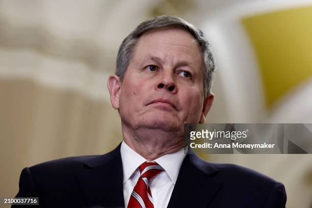 Sen. Steve Daines listens during a news conference following a Senate Republican policy luncheon at the U.S. Capitol building on March 20, 2024 in...