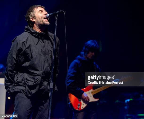 Liam Gallagher and John Squire perform at O2 Apollo Manchester on March 20, 2024 in Manchester, England.