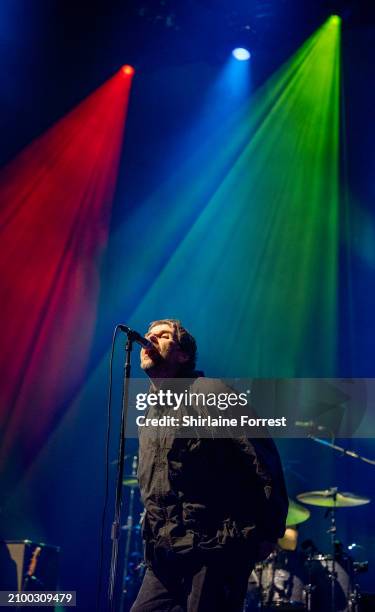 Liam Gallagher performs with John Squire at O2 Apollo Manchester on March 20, 2024 in Manchester, England.