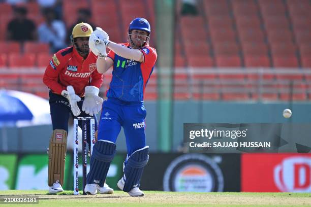 Delhi Capitals' David Warner plays a shot during the Indian Premier League Twenty20 cricket match between Punjab Kings and Delhi Capitals at the...