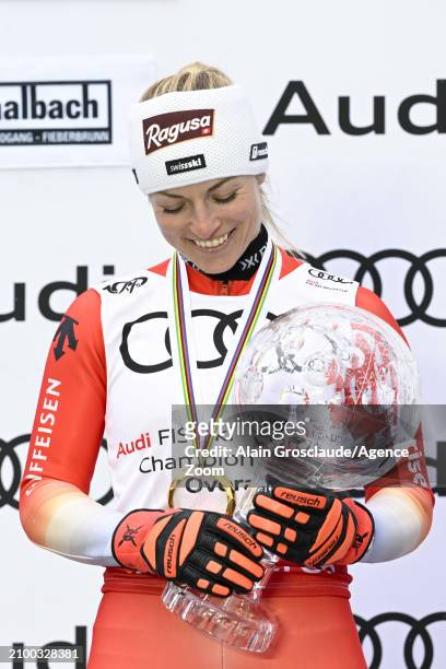 Lara Gut-behrami of Team Switzerland wins the globe in the overall standings during the Audi FIS Alpine Ski World Cup Finals Women on March 23, 2024...