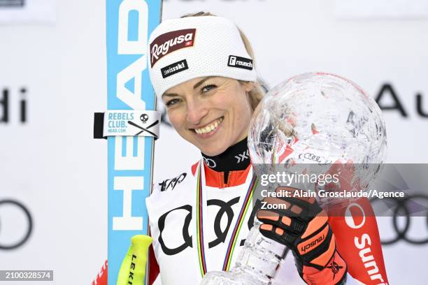 Lara Gut-behrami of Team Switzerland wins the globe in the overall standings during the Audi FIS Alpine Ski World Cup Finals Women on March 23, 2024...