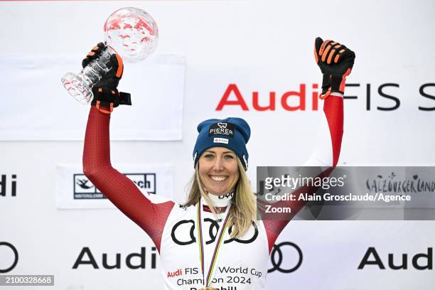 Cornelia Huetter of Team Austria wins the globe in the overall standings during the Audi FIS Alpine Ski World Cup Finals Women's Downhill on March...