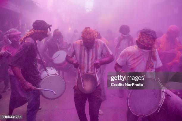 People are celebrating Holi with various musical instruments in the streets of Kolkata, India, on March 23, 2024. Holi, also known as the festival of...