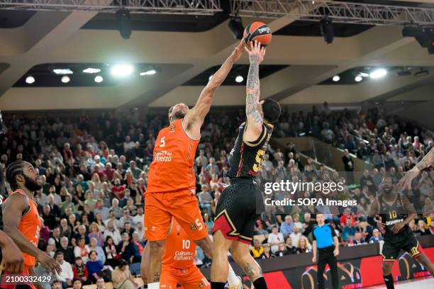 Monaco player Mike James and Valence player Justin Anderson seen in action during the Euroleague match between AS Monaco and Valence Basket at salle...