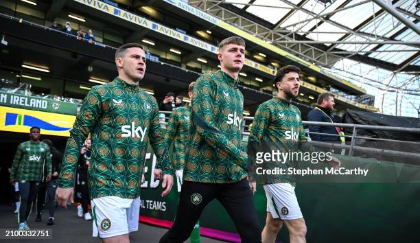 Dublin , Ireland - 23 March 2024; Republic of Ireland players, from left, Josh Cullen, Evan Ferguson and Mikey Johnston before the international...