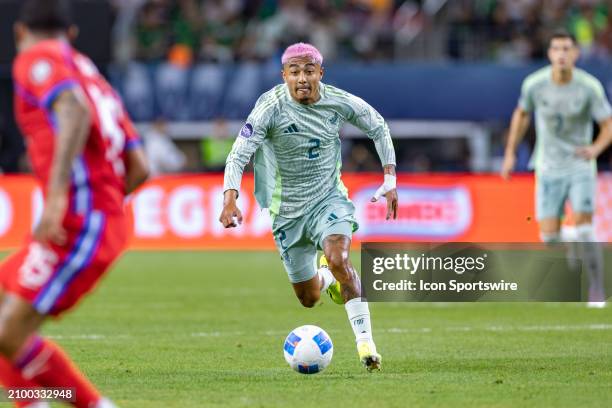 Mexico defender Julian Araujo dribbles up field during the Concacaf Nations League semi final match between Mexico and Panama on March 21, 2024 at...